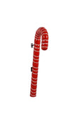 A red and white striped candy cane wall hook mounted on a light gray textured wall.