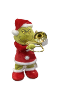 Grinch plush toy wearing a red Santa hat and Santa suit with white trim, holding a gold brass trumpet against a plain white background.